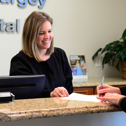 Patient turning in dental insurance forms