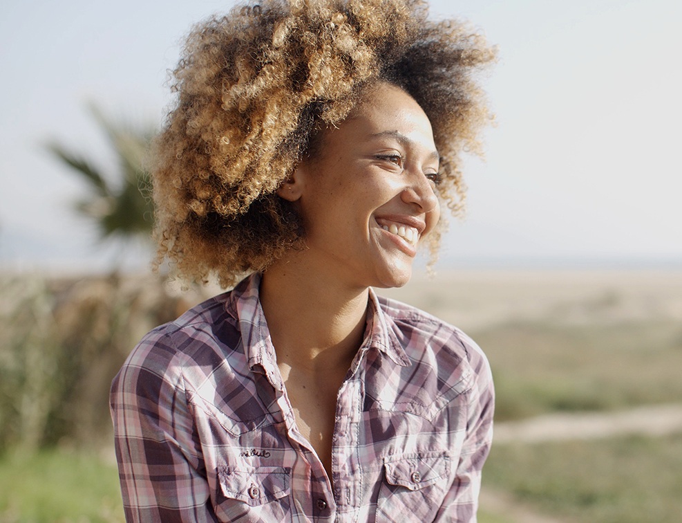 Woman with gorgeous smile after cosmetic dentistry