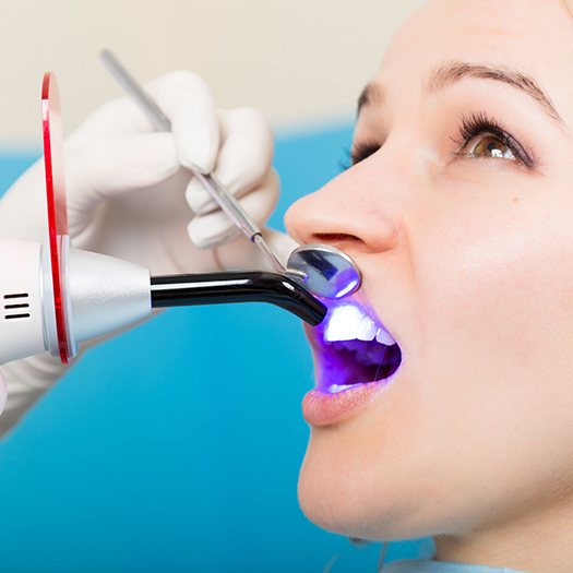 Patient receiving cosmetic dental bonding