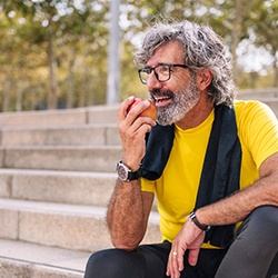 Health benefits of implant dentures include the ability to eat a more nutritious diet