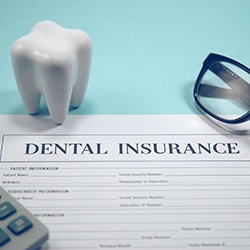 Dental insurance claim form on blue background