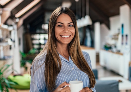 Woman with gorgeous smile after cosmetic dentistry