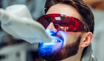 Man getting KOR® teeth whitening in-office in Ambingdon