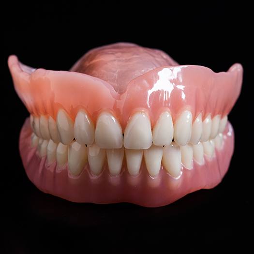 Full set of natural looking dentures