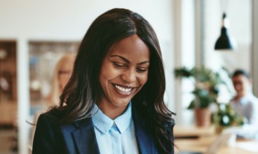 Woman smiling after periodontal therapy