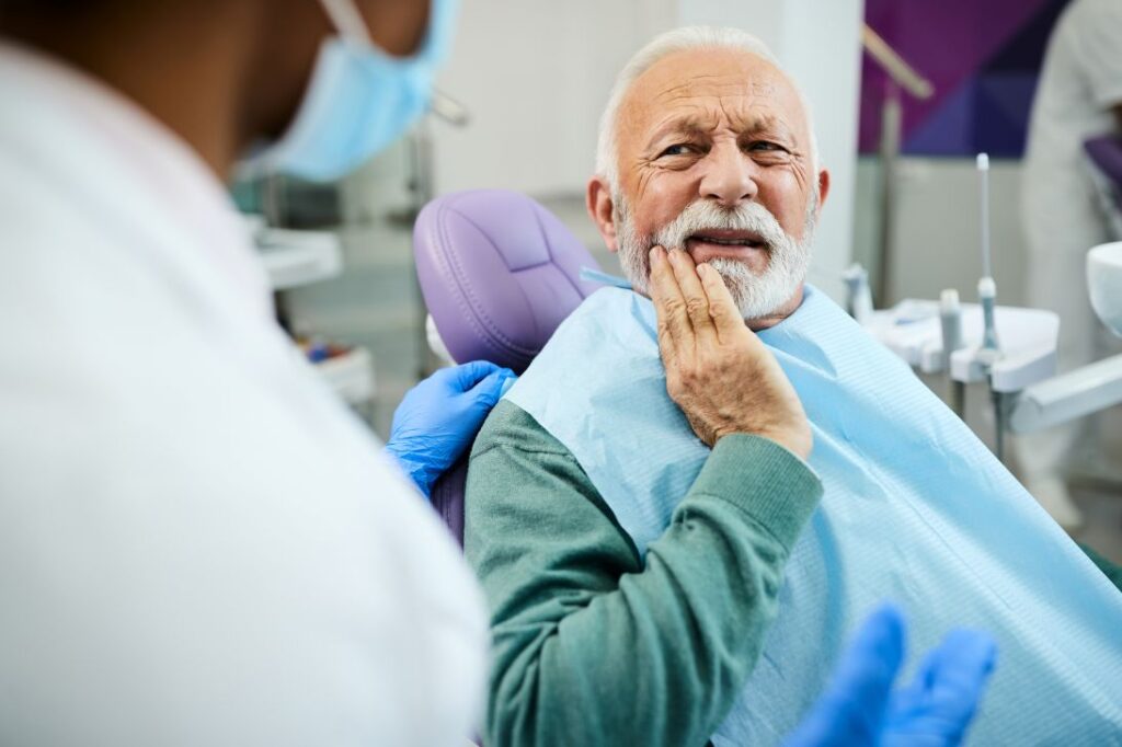 A man with a painful toothache
